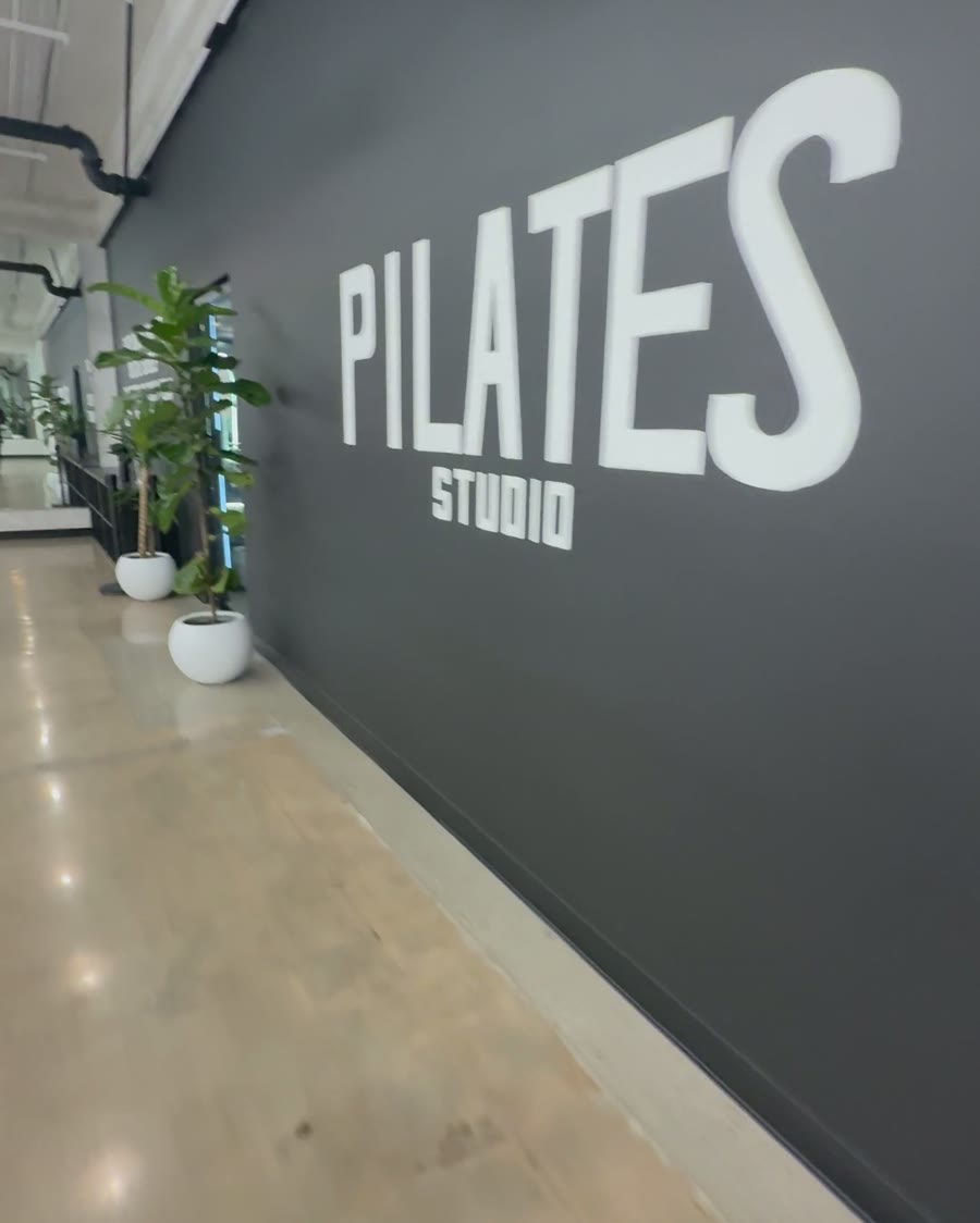 The finished Pilates Studio wall at All One Gym in Lakewood