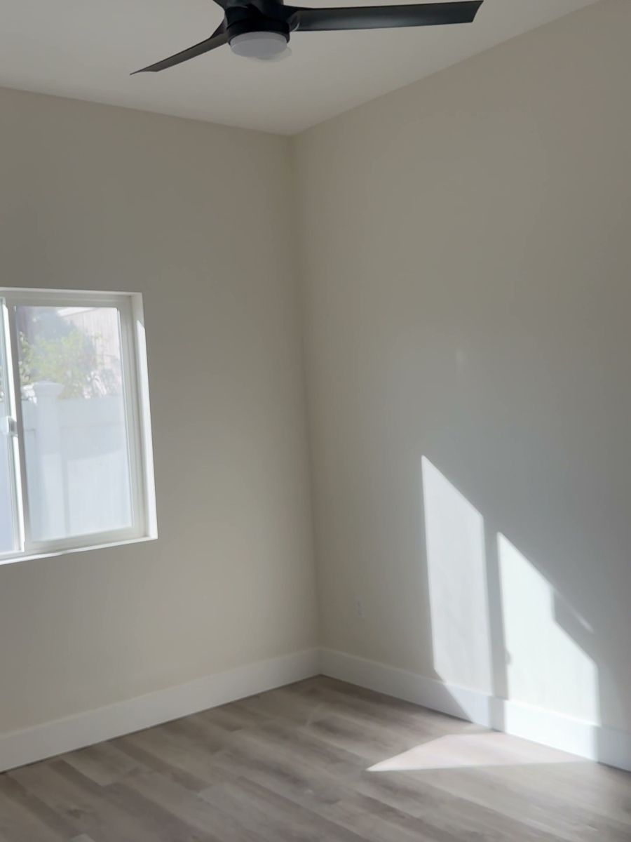 Second bedroom with ceiling fan