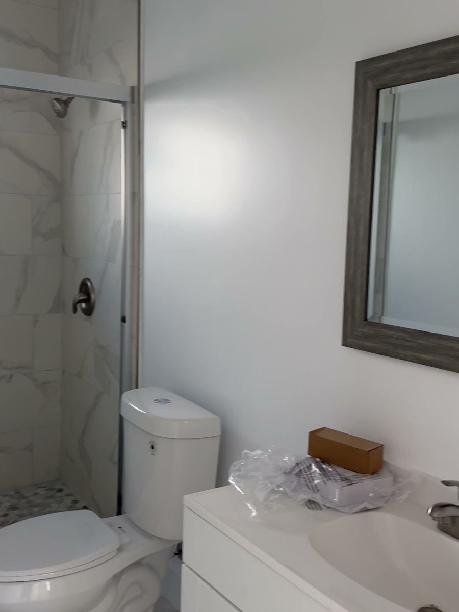 Tiled shower and vanity