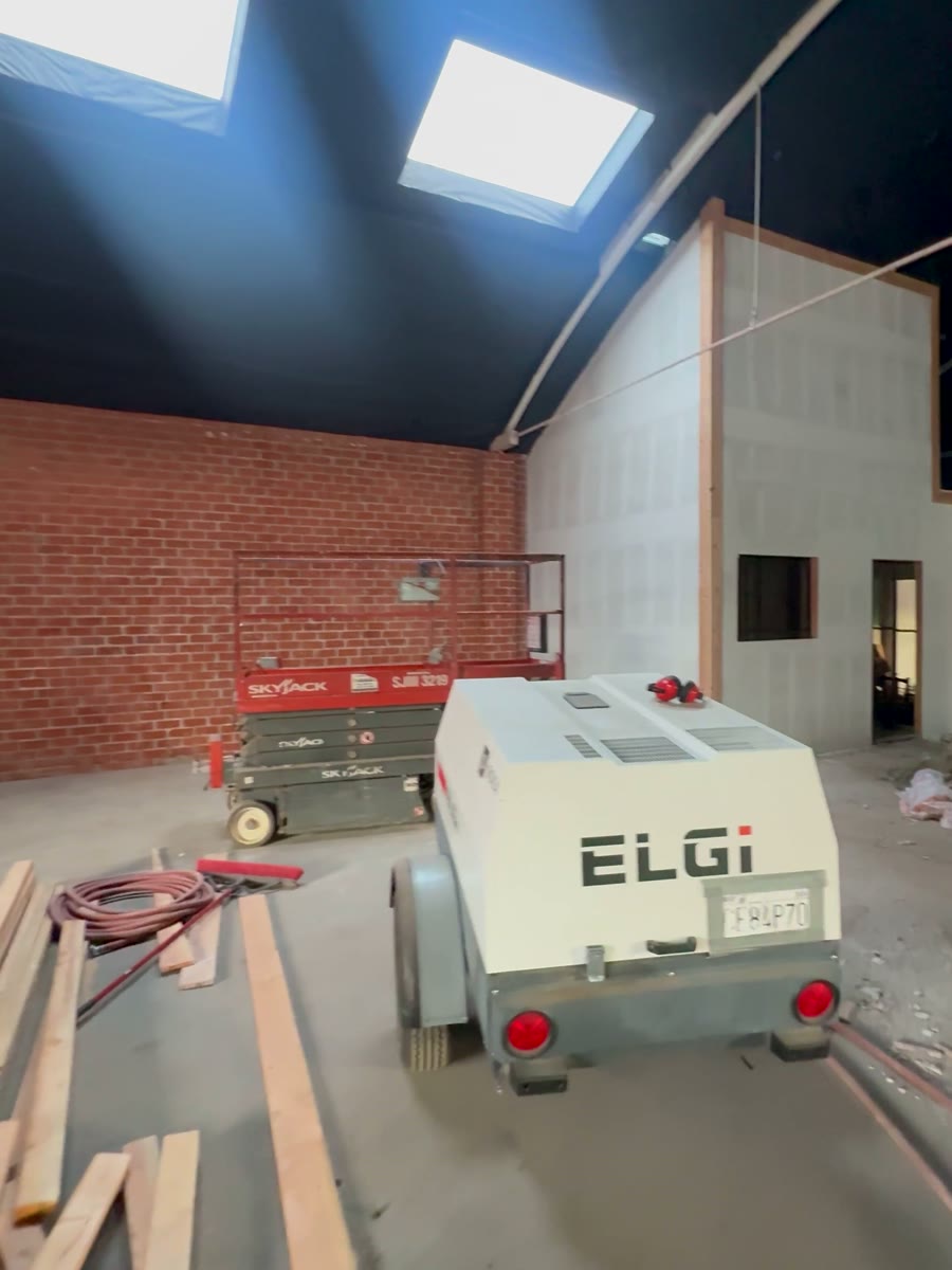 New walls & skylights during the Los Angeles warehouse fire rebuild