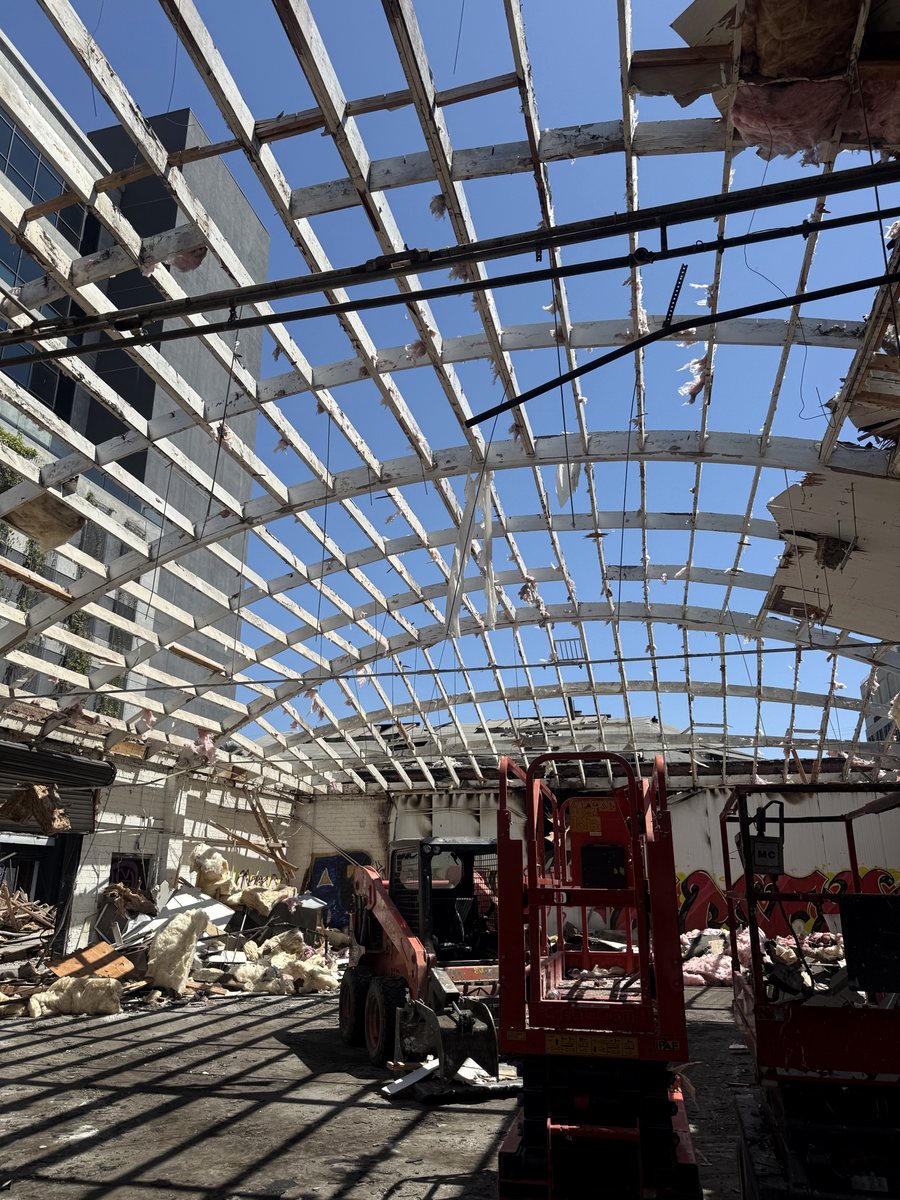 Bow trusses exposed after the fire