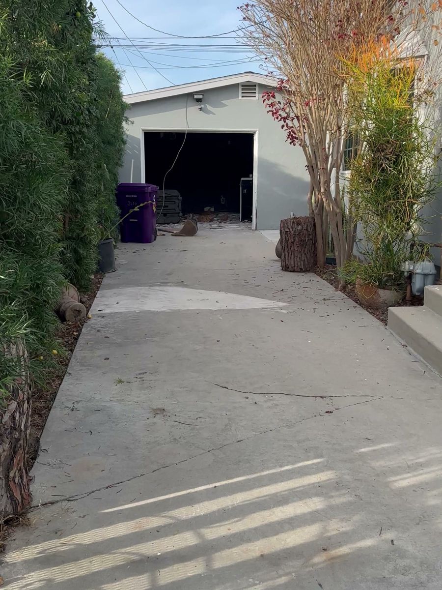The driveway to the backyard before