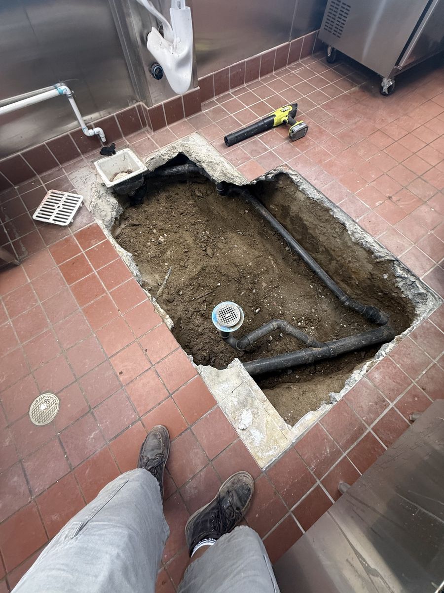 Restaurant kitchen floor opened for drain work