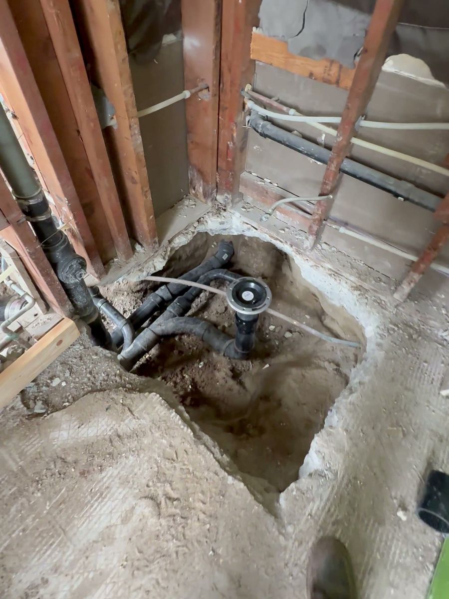 Kitchen tie-in during the Miches de la Baja grease interceptor installation