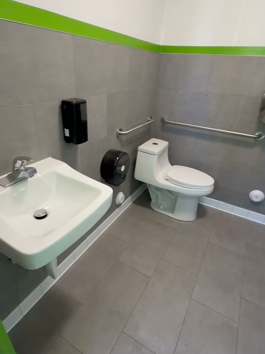 Accessible restaurant restroom with grab bars