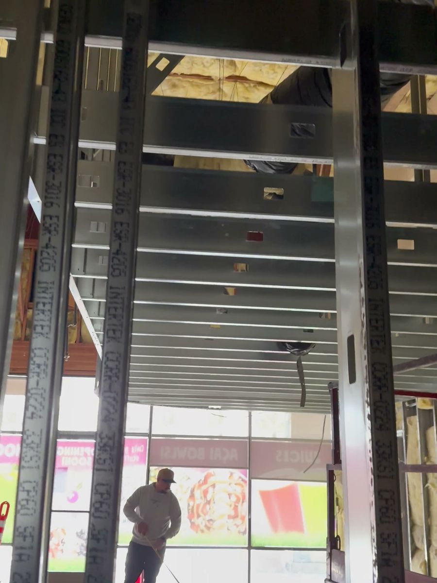 Framing looking out to the storefront